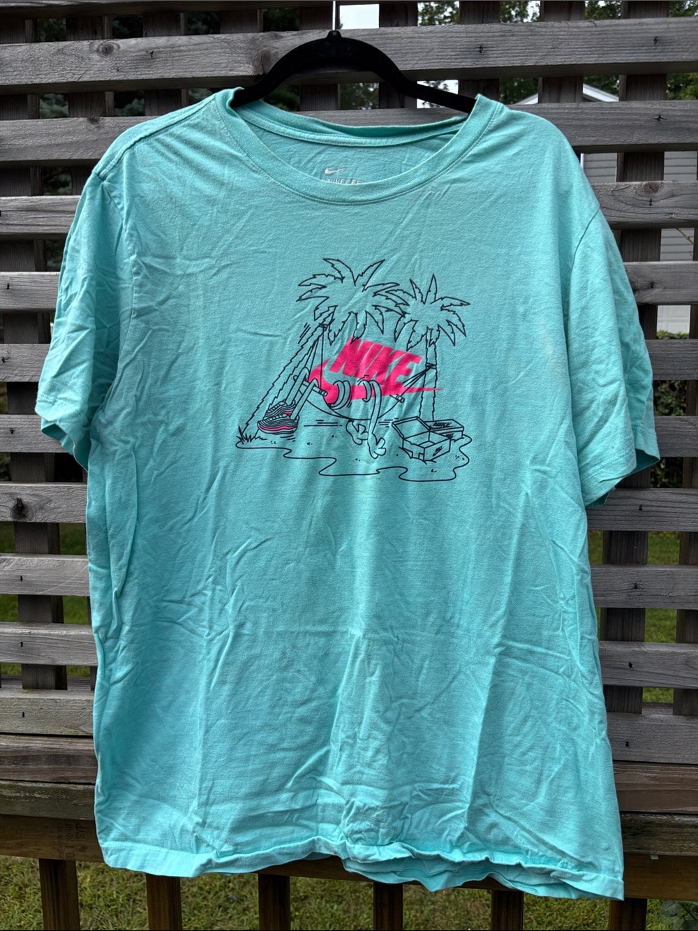 Nike Short-Sleeve Teal Tee with Pink Graphic
